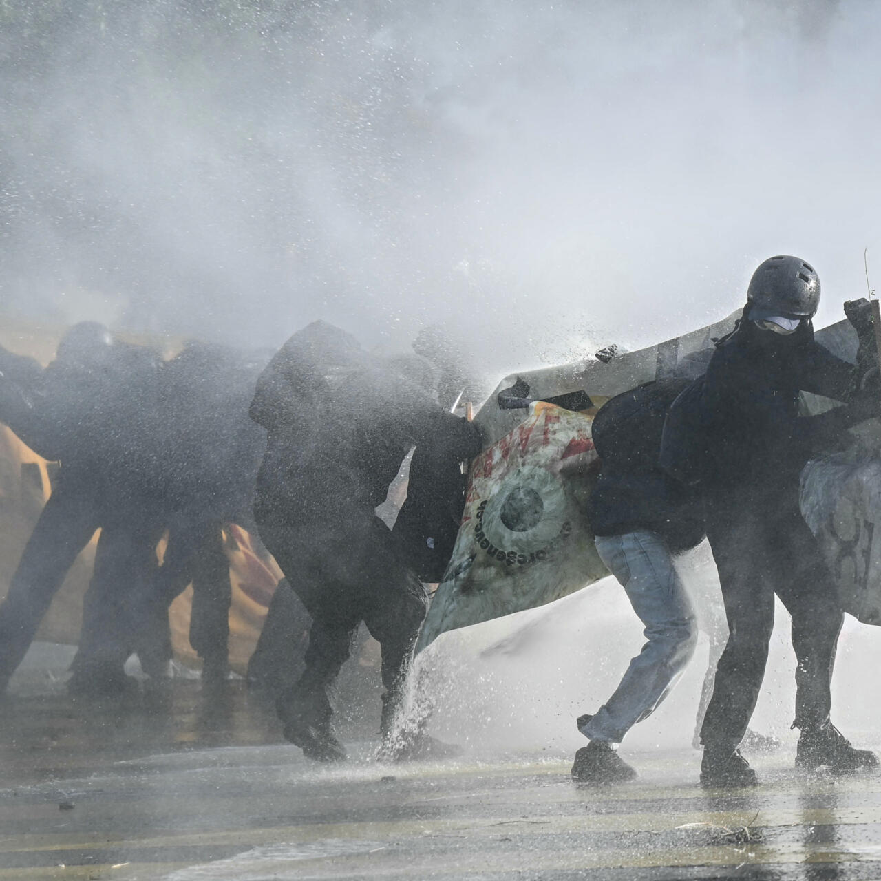 geneva-g7-protest-turns-violent-as-police-deploy-tear-gas-and-water-cannon