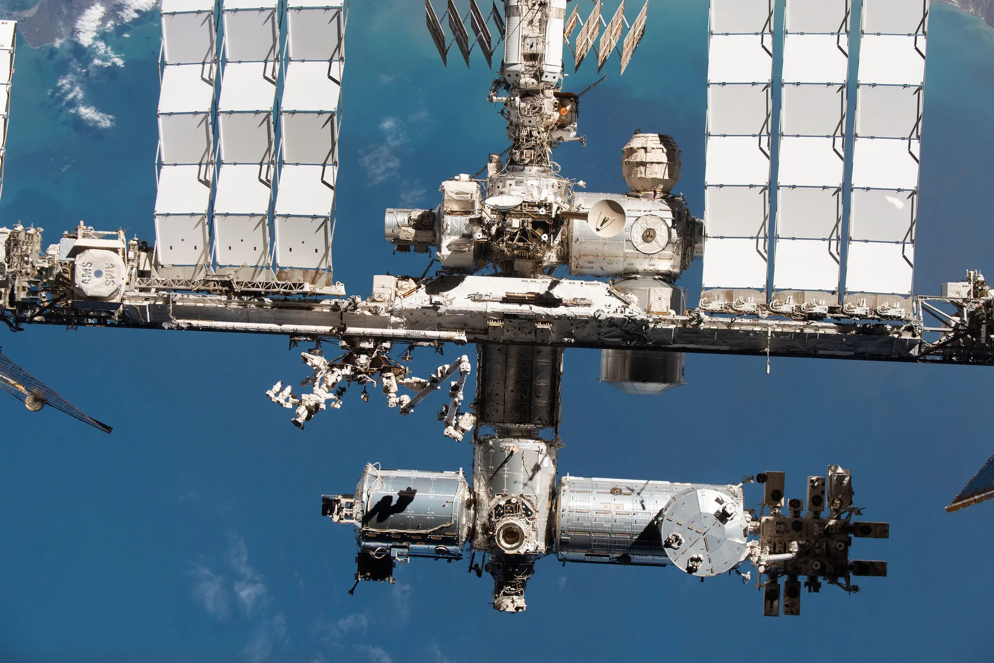 iss-crew-shelters-in-spacex-dragon-as-cosmonauts-tackle-a-stubborn-air-leak