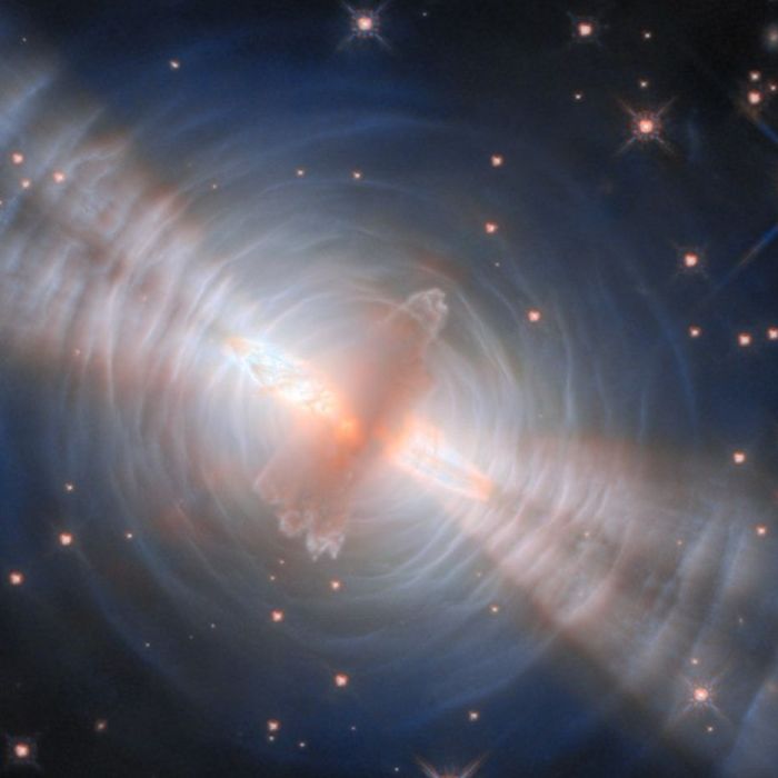 A Cosmic Swarm: Hubble Captures Thousands of Galaxies and the Bending of Ancient Light