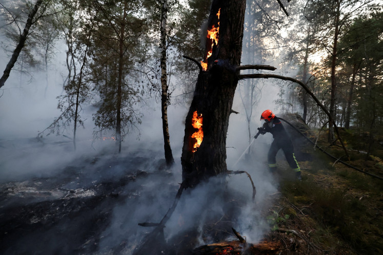 volunteer-firefighter-suspected-of-igniting-devastating-france-forest-fire