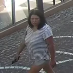 Manhunt for Ukrainian Woman With Snake Tattoo
