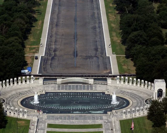 Trump’s ‘American Flag Blue’ Reflecting Pool Fades to Gray After Costly Revamp