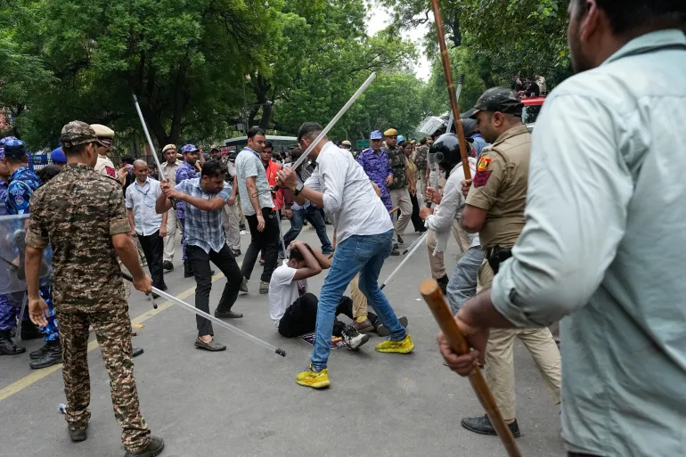 indias-cockroach-movement-refuses-to-disperse-after-delhi-police-crackdown-injures-180