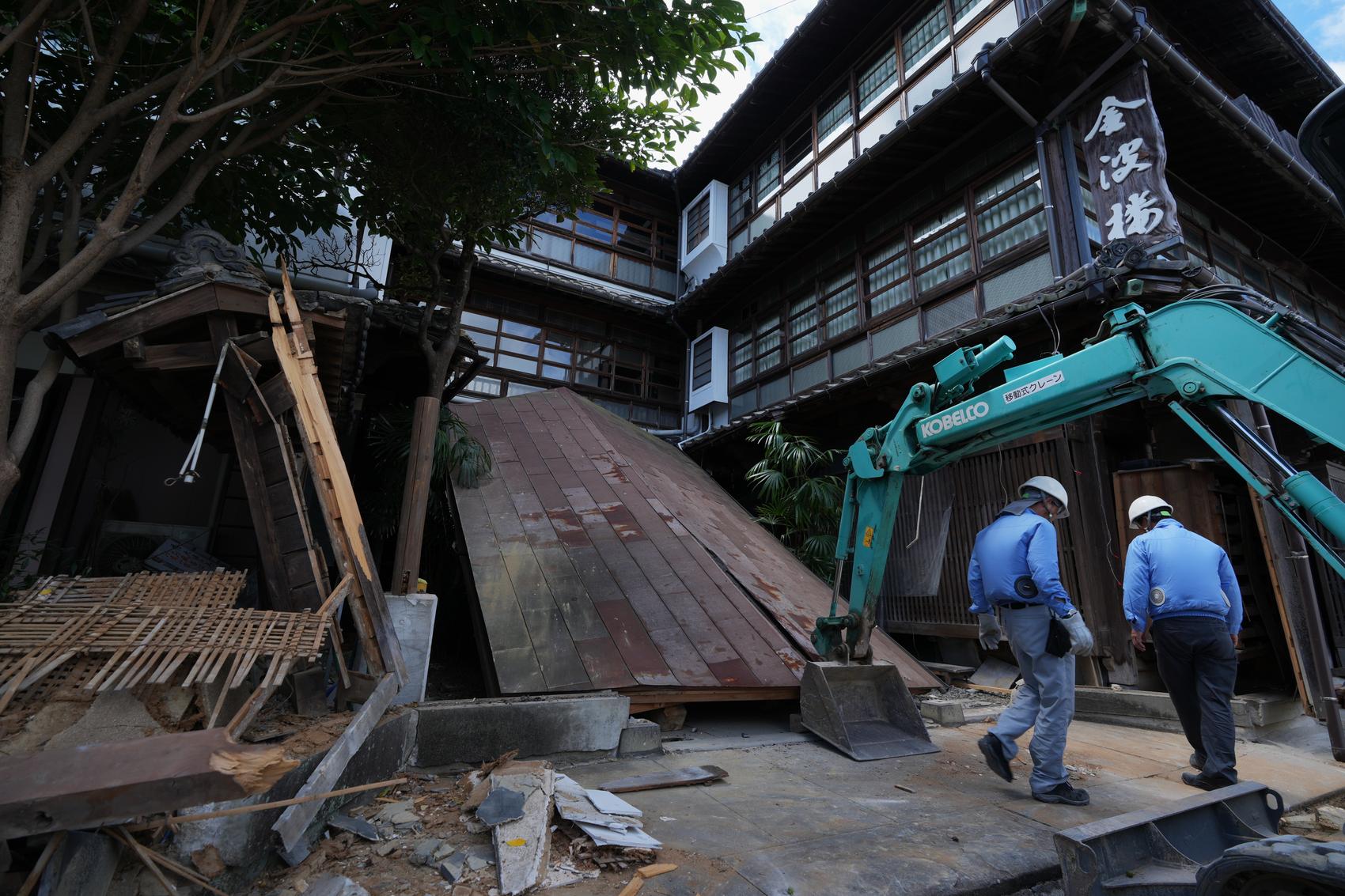 sent-back-for-the-cash-register-the-order-that-cost-two-lives-in-japans-quake-hit-mall